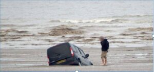 Cartoon car sinking underwater with technology components floating around